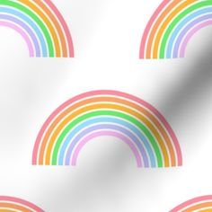 a white background with multicolored rainbows