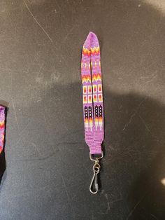 a pair of lanyards that are sitting on a table