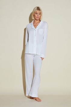 Our famous Bella PJs original fit long sleeve top and long pants lounge and sleepwear set. Super soft Peruvian Pima cotton and modal set with contrast or tonal satin piping. Classic, original fit. Long sleeve, fitted button down top with patch pocket. Straight leg pants with elastic waistband. Cold water wash and hang to dry. Do not dry in dryer. | Cosabella - Women's Bella Long Sleeve Top & Pant Pajama Set Pajama in White | Size 1X | Cotton Set | Cosabella - Women's Bella Long Sleeve Top & Pant Top And Pants Set, Sleepwear Sets, Sleepwear & Loungewear, Cotton Set, Menswear Inspired, Pant Set, Pima Cotton, Long Pants, Straight Leg Pants