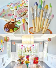 there are many crafts and decorations on the table in this room, including paintbrushes