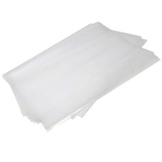 white plastic bags are stacked on top of each other, ready to be used as food wrappers