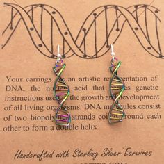 My handcrafted DNA strand earrings make a fun and unique fashion statement for the lover of biology & genetics, or for someone you care about whom shares your DNA! These earrings are available in silver color, metallic rainbow, 18k Gold and 18k Rose Gold finish. Comes on Sterling Silver ear wires, 14k Gold Filled, or 14k Rose Gold filled ear wires (depending on finish color selected). ✦ DETAILS ✦ * Hand-cast from Upcycled Alloy * Comes with Sterling Silver ear wires, 14k Gold Filled, or 14k Biology Genetics, Dna Earrings, Dna Strand, Metallic Rainbow, Colorful Gifts, Themed Jewelry, Hand Cast, Sterling Earrings, 18k Rose Gold