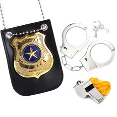 a police badge and keychain are on display