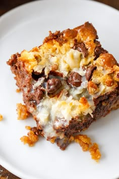 a piece of cake sitting on top of a white plate