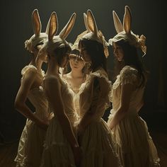 four women dressed in bunny ears standing next to each other