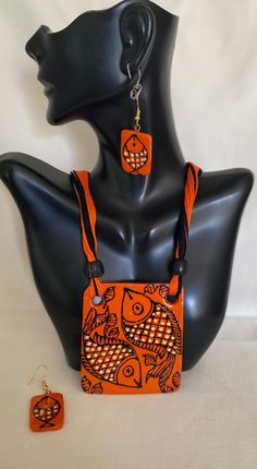 This piece of traditional Indian jewelry is known as terracotta. Made from clay, it is modeled into a shape then baked. It is then painted on, and terracotta pieces can depict anything from real images to abstract art. All Terracotta products are hand-made jewelry. Each piece is hand painted by the artisans and there might be some slight discrepancy in terms of symmetry of the design or in terms of color. The listing photographs clearly show the design and the symmetry within the designs. Color Handmade Clay Jewelry Indian, Terracotta Products, Diy Earrings Materials, Wooden Jewelery, Painted Necklace, Terracotta Jewellery Designs, Hand Painted Necklace, Bridal Braids, Journal Jewelry