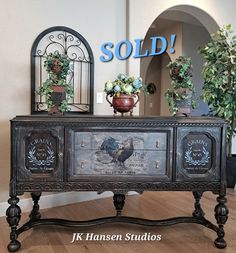 an old sideboard has been painted with roosters and plants on it for sale