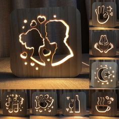 some wooden blocks with lights on them and various designs in the shape of people's faces