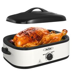 an image of a roasting chicken in a slow cooker with the lid open