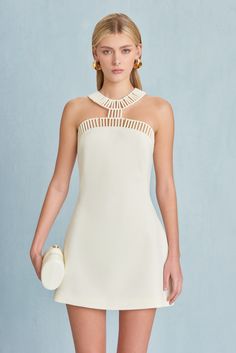 CULT GAIA SERAFINA DRESS IN OFF WHITE Christiana Mini Dress, White Dress Gold Straps, Cult Gaia Cutout Dress, Crepe Short Wedding Dress, Coperni White Dress, Halterneck Dress Accessories, Cool Semi Formal Dresses, Short Greek Inspired Dress, Greek Embroidered Dress