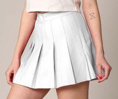 This cute skort by Made By Johnny is perfect for tennis, long walks, or even your school uniform. It comes in both solid colors and plaids, easy to coordinate for any outfit or any cosplay! You'll love the inner shorts which also feature a side pocket to hold your phone. The skort is easy to put on with a 2 inch side zipper. Pleated skort with inner shorts Shorts lining feature side phone pocket Great for active lifestyles Long Walks, Johnny Was, Active Lifestyle, Side Pocket, Put On, Side Zipper, High Waisted Skirt, Solid Colors, Tennis