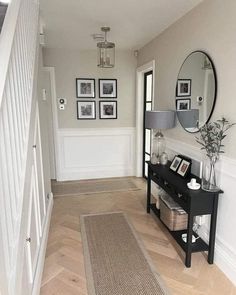 the hallway is clean and ready for us to use as an entrance way in this home