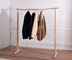 Wooden clothing rack made with beautiful hand-carved chestnut stems. This is the large version of our clothes rack, especially convenient for cosy homes requiring a wide dressing capacity and for trendy clothes shops looking for genuine functional furnitures.   The wood is beige in color with a fine grain. Hand-shaved using traditional hand tools which allow to follow the natural curves of the wood, its texture is superb and pleasant to the touch.  The wood comes from the pruning of oak and ches Wooden Clothing Rack, Wood Clothes Rack, Cosy Homes, Wooden Clothes Hanger, Wooden Clothes Rack, Coastal Clothing, Clothes Hanger Rack, Valet Stand, Clothes Shops