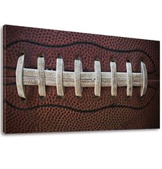 an old fashioned football on a white background canvas print wall art - ready to hang