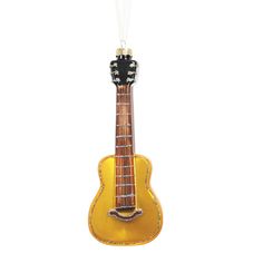 a yellow guitar ornament hanging from a string