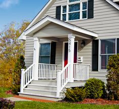 the front cover of a book with an image of a house and porch on it