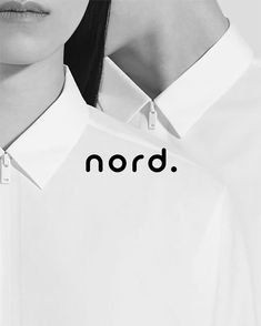 a black and white photo with the word nord on it