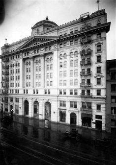 an old black and white photo of a building