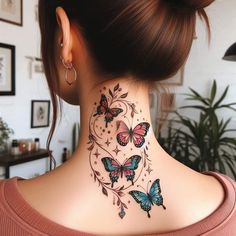 a woman with a butterfly tattoo on her neck