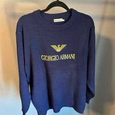 Very Fancy Yet Casual Feel At The Same Time Can Be Worn For Either Occasion, Armani Sweater Navy Blue And Gold. Questions? Leave A Comment Below! Being Sent To A Vintage Consignment Store At The End Of The Month! Start Posting If You Want It Before It’s Gone. Armani Sweater, Navy Knit Sweater, Giorgio Armani Men, Navy Blue And Gold, Sweater Navy Blue, Sweaters Crewneck, Armani Men, Blue And Gold, Giorgio Armani