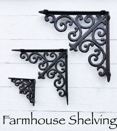 an iron shelf bracket on the side of a white painted building with text farmhouse shelving