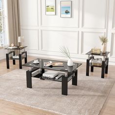 three tables with glass tops in a living room