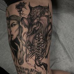 a woman's leg with a tattoo on it and an image of a demon