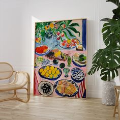 a painting on the wall next to a chair and potted plant in a room