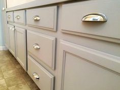 a close up of drawers in a bathroom