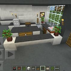 an image of a kitchen in minecraft with plants on the counter and potted trees