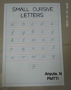 a small cursive letter is shown in this handwritten handwriting practice manual for kids