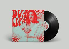 a black and red vinyl album with an image of a woman