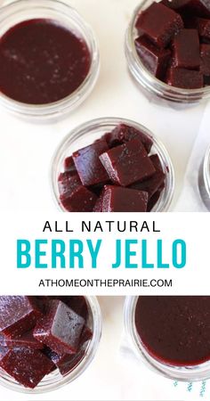 four jars filled with beet jello on top of a table