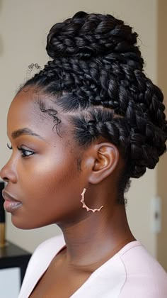 25 Big Twist Braids Hairstyles: Redefining Beauty with Every Strand Updo Twists For Black Women, Formal Twist Hairstyles, Marley Twist Updo Hairstyles, Updo Twist Hairstyles, Jumbo Braids Updo, Jumbo Twists Updo, Hairstyles With Cuban Twist Hair, Jumbo Braids In A Bun, Jumbo Box Braids In A Bun