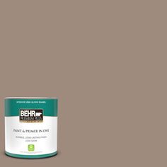 the behr paint is light tan and has a brown base with white trim on it