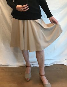 Beige skirt with angled seam going down from the high hip to the hem. The lower half has a lovely draped flare, making this a great skirt for day wear or dancing. The skirt has a side zipper and measures 44cm (17") across the waist and is 64cm (25") long. It is made from a fine twill-weave polyester fabric. One only - made from my fabric stock. Check out my other listings and combine the postage. Beige A-line Pleated Skirt For Fall, Classic Beige A-line Skirt, Fitted Beige Asymmetrical Skirt, Fitted Asymmetrical Beige Skirt, Beige Fitted Asymmetrical Skirt, Fall Stretch A-line Pleated Skirt, Chic Beige Stretch Pleated Skirt, Chic Stretch Beige Pleated Skirt, Cream Fitted Asymmetrical Skirt