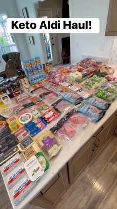 a kitchen counter covered in lots of food