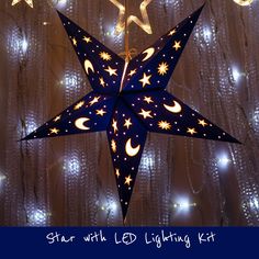 a star with led lighting kit hanging from the ceiling