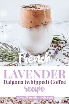 lavender whipped coffee recipe in a jar on a white table with lavender sprinkled around it