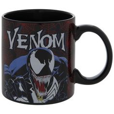 a black coffee mug with the words venom on it