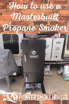 a black smoker sitting in front of a brick wall with the words how to use a masterbuil propane smoker