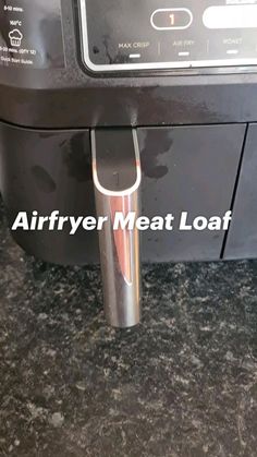 an air fryer that is on top of a counter with the words air fryer meat loaf