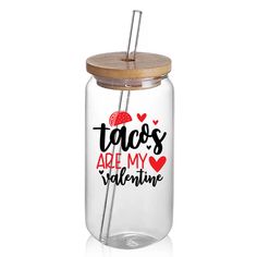 a glass jar with a straw in it and the words tacos are my valentine