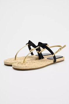 METALLIC SANDAL WITH CONTRASTING BOW - Gold | ZARA United States Summer Slingback Sandals With Bow, Summer Slingback Sandals With Bow Straps, Elegant Bow Sandals For Vacation, Summer Beach Sandals With Bow Straps, Cargo Vest, Career Woman, Trench Jacket, Metallic Sandals, Cardigan Sweater Dress