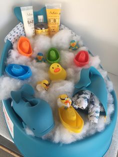 a bath tub filled with lots of toys