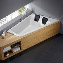 a bath tub sitting on top of a wooden counter