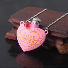 Love Potion Pink Heart Bottle Bohemian Statement Pendant Necklace Brand New Pink Enameled Over Copper Alloy Pendant Finished Copper Alloy Chain Chain 21“ In Length Feel Free To Ask Questions, Reasonable Offers Will Be Considered. (Smoke Free Environment) Same Day Or Next Day Shipping Five Star Rated Posh Ambassador Seller Other Listings: Engagement Rings Diamond Bands 10k 14k 18k Gold White Gold Platinum Rose Gold Earrings Necklaces Bracelets Bridal Promise Wedding Prom Ruby Emerald Sapphire Mic Heart Bottle, Friends Jewelry, Diamond Band Engagement Ring, Magic Love, Engagement Rings Diamond, Friend Jewelry, Platinum Rose Gold, Love Potion, Necklace Collar