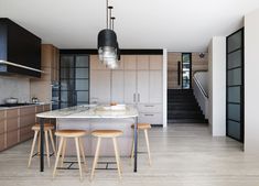 the kitchen is clean and ready to be used as a dining room or living area