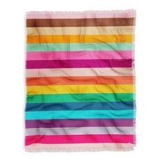 a multicolored blanket on a white background