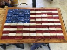 an american flag made out of blocks of wood